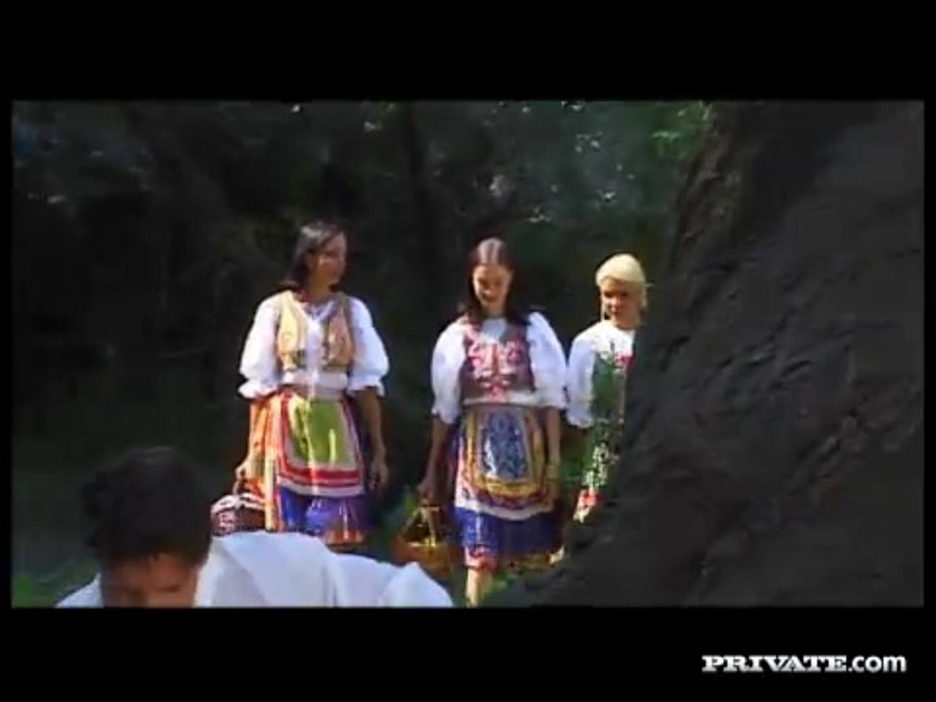 Three Sexy Girls Seduce a Lone Man While Bathing in a Lake