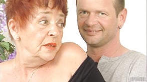 Redhead granny captivates with daring hairy passion in thrilling intimate play