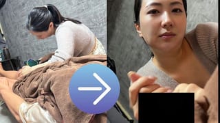 A Girl in her Twenties with Big at the Men's VIO Hair Removal Salon gives a to a Customer at Work