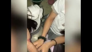 Two College Girls Sucking Dick at College