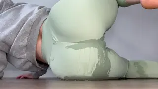 Girl Laying on the Floor Pee herself in Yoga Pants